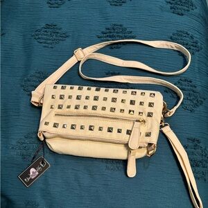 Vegan PU studded clutch with crossbody option
Creamy white w/gold hardware